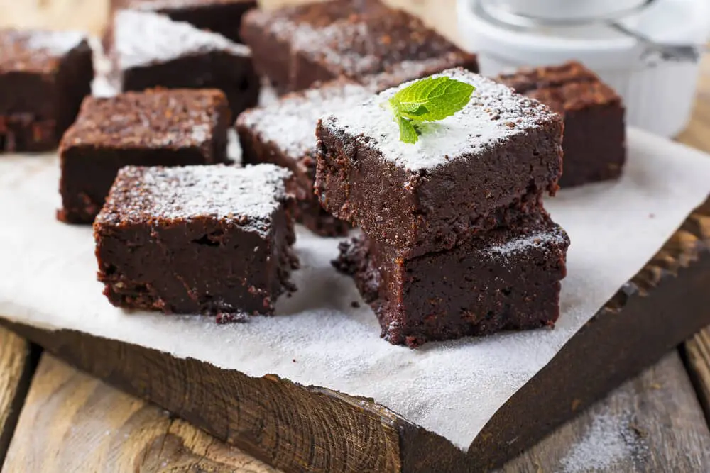 A close up of some brownies on a table